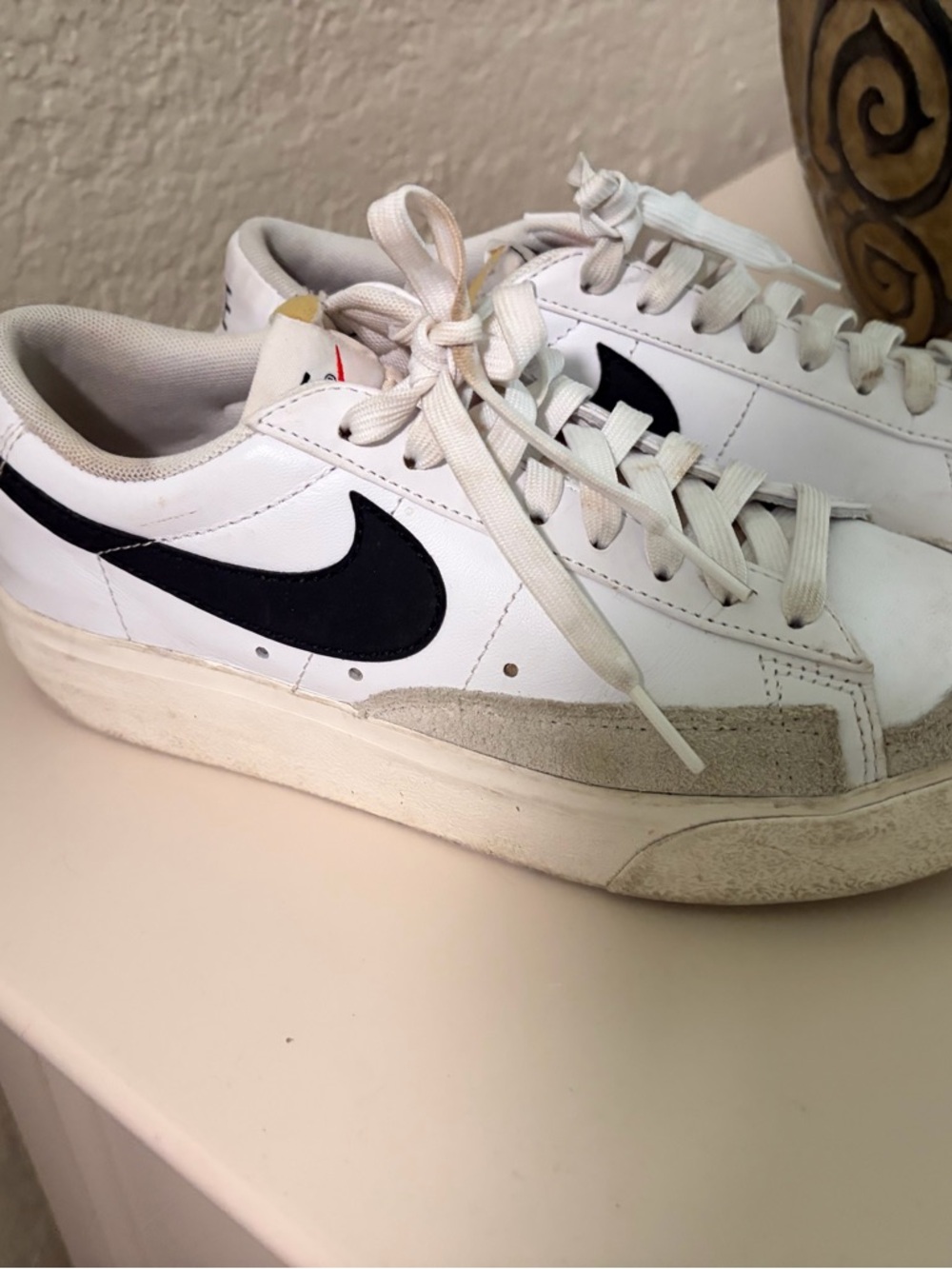 Nike White Sneakers with Black Swoosh and Gray Suede Trim